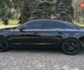 Черный Ауди А6, объемом двигателя 2 л и пробегом 200 тыс. км за 14500 $, фото 3 на Automoto.ua