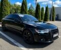 Чорний Ауді А6, об'ємом двигуна 2 л та пробігом 165 тис. км за 14200 $, фото 1 на Automoto.ua