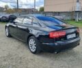 Черный Ауди А6, объемом двигателя 1.98 л и пробегом 205 тыс. км за 12500 $, фото 1 на Automoto.ua