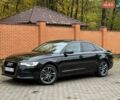 Чорний Ауді А6, об'ємом двигуна 1.97 л та пробігом 249 тис. км за 14799 $, фото 1 на Automoto.ua