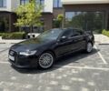 Черный Ауди А6, объемом двигателя 2 л и пробегом 300 тыс. км за 16000 $, фото 1 на Automoto.ua