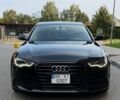 Черный Ауди А6, объемом двигателя 2 л и пробегом 175 тыс. км за 14200 $, фото 1 на Automoto.ua