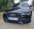 Черный Ауди А6, объемом двигателя 3 л и пробегом 209 тыс. км за 16800 $, фото 1 на Automoto.ua