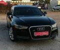 Черный Ауди А6, объемом двигателя 2 л и пробегом 241 тыс. км за 12200 $, фото 1 на Automoto.ua