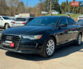 Черный Ауди А6, объемом двигателя 2 л и пробегом 161 тыс. км за 13690 $, фото 1 на Automoto.ua