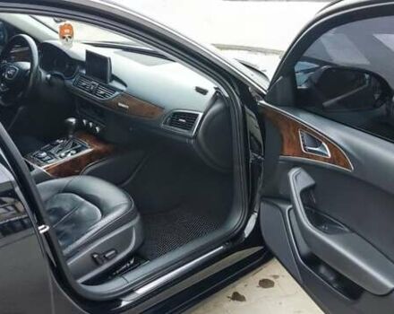 Черный Ауди А6, объемом двигателя 2 л и пробегом 231 тыс. км за 12200 $, фото 1 на Automoto.ua