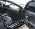 Черный Ауди А6, объемом двигателя 2 л и пробегом 231 тыс. км за 12200 $, фото 1 на Automoto.ua