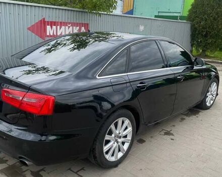Чорний Ауді А6, об'ємом двигуна 2 л та пробігом 233 тис. км за 12500 $, фото 1 на Automoto.ua