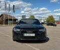 Чорний Ауді А6, об'ємом двигуна 1.98 л та пробігом 215 тис. км за 11990 $, фото 1 на Automoto.ua