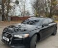 Черный Ауди А6, объемом двигателя 2 л и пробегом 312 тыс. км за 11600 $, фото 1 на Automoto.ua