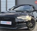 Черный Ауди А6, объемом двигателя 2 л и пробегом 172 тыс. км за 14900 $, фото 1 на Automoto.ua