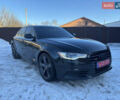 Черный Ауди А6, объемом двигателя 2 л и пробегом 249 тыс. км за 12200 $, фото 1 на Automoto.ua