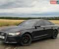 Черный Ауди А6, объемом двигателя 1.98 л и пробегом 320 тыс. км за 11000 $, фото 1 на Automoto.ua