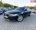 Чорний Ауді А6, об'ємом двигуна 2 л та пробігом 256 тис. км за 12999 $, фото 1 на Automoto.ua