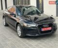 Черный Ауди А6, объемом двигателя 3 л и пробегом 195 тыс. км за 13700 $, фото 1 на Automoto.ua
