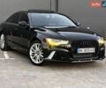 Черный Ауди А6, объемом двигателя 2 л и пробегом 240 тыс. км за 13650 $, фото 1 на Automoto.ua