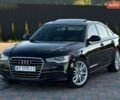 Черный Ауди А6, объемом двигателя 3 л и пробегом 148 тыс. км за 13300 $, фото 1 на Automoto.ua
