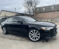 Черный Ауди А6, объемом двигателя 2 л и пробегом 237 тыс. км за 10850 $, фото 1 на Automoto.ua