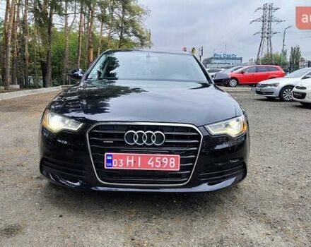 Черный Ауди А6, объемом двигателя 2 л и пробегом 196 тыс. км за 12699 $, фото 1 на Automoto.ua