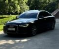 Черный Ауди А6, объемом двигателя 2 л и пробегом 253 тыс. км за 12500 $, фото 1 на Automoto.ua
