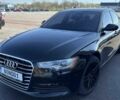 Черный Ауди А6, объемом двигателя 2 л и пробегом 300 тыс. км за 14200 $, фото 1 на Automoto.ua