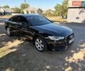 Черный Ауди А6, объемом двигателя 1.98 л и пробегом 260 тыс. км за 10000 $, фото 1 на Automoto.ua