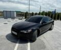 Черный Ауди А6, объемом двигателя 2 л и пробегом 180 тыс. км за 13500 $, фото 1 на Automoto.ua
