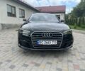 Черный Ауди А6, объемом двигателя 2 л и пробегом 168 тыс. км за 13750 $, фото 1 на Automoto.ua