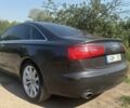 Чорний Ауді А6, об'ємом двигуна 2 л та пробігом 185 тис. км за 7494 $, фото 1 на Automoto.ua