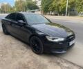 Черный Ауди А6, объемом двигателя 2 л и пробегом 308 тыс. км за 13500 $, фото 1 на Automoto.ua