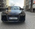 Черный Ауди А6, объемом двигателя 1.98 л и пробегом 148 тыс. км за 14800 $, фото 1 на Automoto.ua
