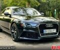 Черный Ауди А6, объемом двигателя 2 л и пробегом 140 тыс. км за 13900 $, фото 1 на Automoto.ua