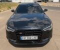 Черный Ауди А6, объемом двигателя 1.97 л и пробегом 179 тыс. км за 15300 $, фото 1 на Automoto.ua