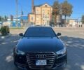 Черный Ауди А6, объемом двигателя 1.98 л и пробегом 185 тыс. км за 13400 $, фото 1 на Automoto.ua