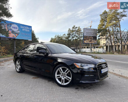 Черный Ауди А6, объемом двигателя 2 л и пробегом 265 тыс. км за 12200 $, фото 1 на Automoto.ua