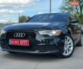Черный Ауди А6, объемом двигателя 2 л и пробегом 182 тыс. км за 11850 $, фото 1 на Automoto.ua