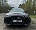 Черный Ауди А6, объемом двигателя 2 л и пробегом 175 тыс. км за 12000 $, фото 1 на Automoto.ua