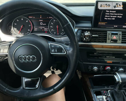 Черный Ауди А6, объемом двигателя 1.98 л и пробегом 170 тыс. км за 15500 $, фото 3 на Automoto.ua