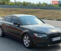 Черный Ауди А6, объемом двигателя 1.98 л и пробегом 240 тыс. км за 11500 $, фото 1 на Automoto.ua