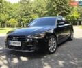 Черный Ауди А6, объемом двигателя 2 л и пробегом 260 тыс. км за 10600 $, фото 1 на Automoto.ua