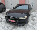 Черный Ауди А6, объемом двигателя 2 л и пробегом 193 тыс. км за 13200 $, фото 1 на Automoto.ua