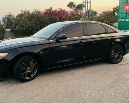 Черный Ауди А6, объемом двигателя 2 л и пробегом 165 тыс. км за 14600 $, фото 1 на Automoto.ua