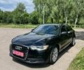 Черный Ауди А6, объемом двигателя 2 л и пробегом 237 тыс. км за 13350 $, фото 1 на Automoto.ua