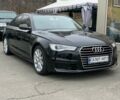 Черный Ауди А6, объемом двигателя 2 л и пробегом 170 тыс. км за 23000 $, фото 1 на Automoto.ua