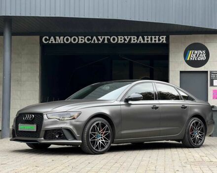 Черный Ауди А6, объемом двигателя 2 л и пробегом 220 тыс. км за 13900 $, фото 1 на Automoto.ua