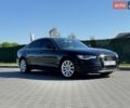 Чорний Ауді А6, об'ємом двигуна 1.98 л та пробігом 209 тис. км за 12800 $, фото 1 на Automoto.ua