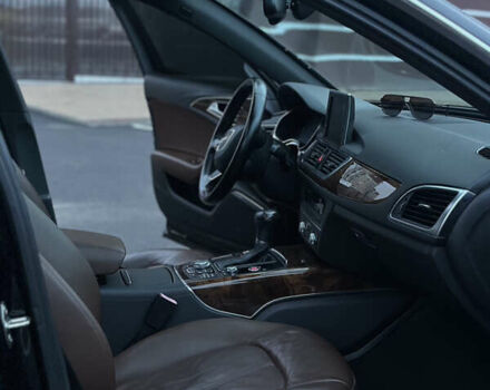 Черный Ауди А6, объемом двигателя 2 л и пробегом 218 тыс. км за 12250 $, фото 7 на Automoto.ua