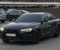 Черный Ауди А6, объемом двигателя 2 л и пробегом 237 тыс. км за 12799 $, фото 1 на Automoto.ua