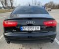 Черный Ауди А6, объемом двигателя 2 л и пробегом 249 тыс. км за 19000 $, фото 1 на Automoto.ua
