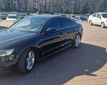 Черный Ауди А6, объемом двигателя 1.97 л и пробегом 244 тыс. км за 17500 $, фото 2 на Automoto.ua